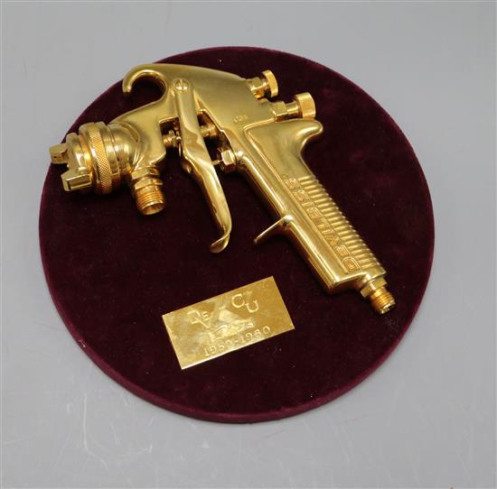 A DeVilbiss presentation gold plated spray gun